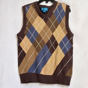 the children place sweater vest